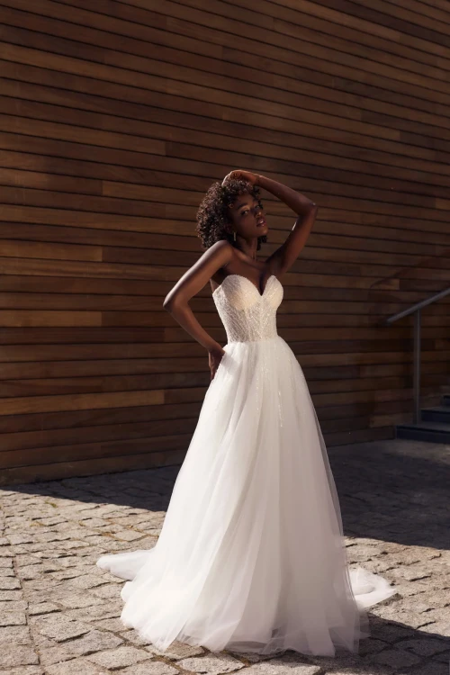 reni gorsetowa suknia ślubna.webp