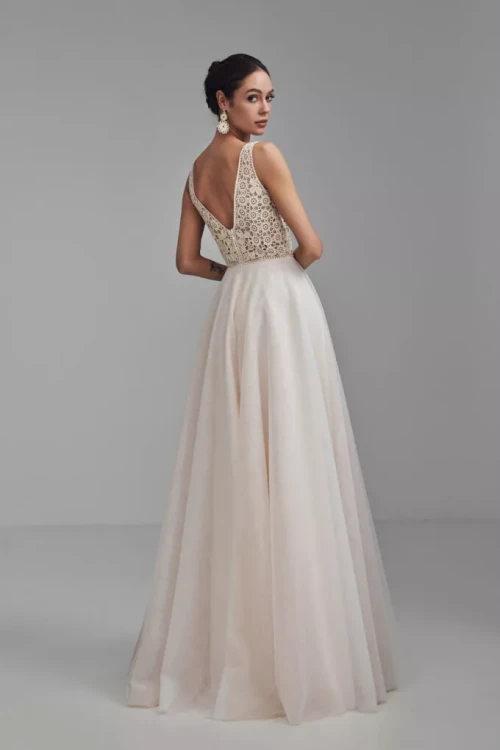 xManuela-back-680x1020-c-default.jpg.pagespeed.ic.x7iJBd5Gbq.webp